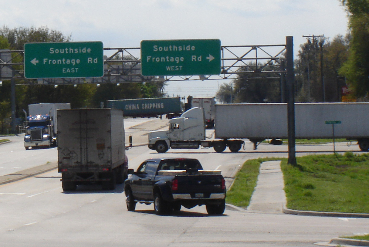 Trucks crossing the intersection near I-4 & County Line Road must occasionally wait a long time to safely complete turns due to the lack of traffic signals